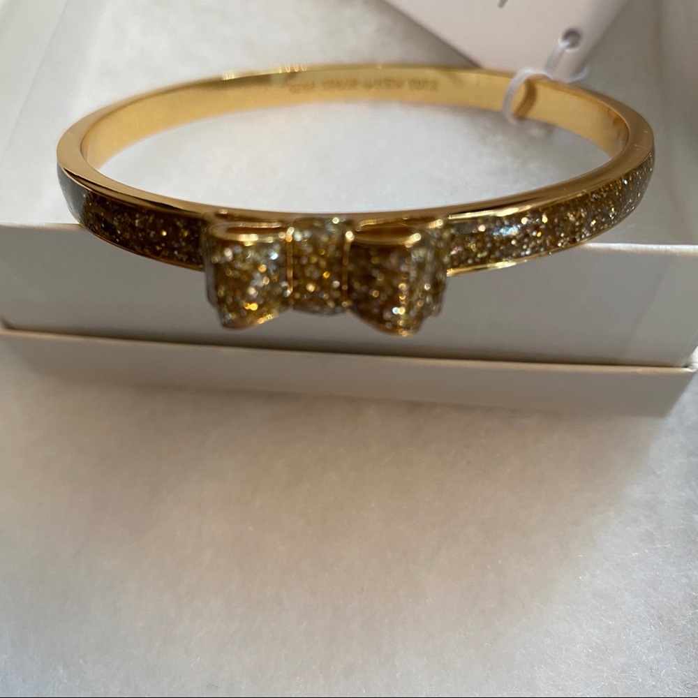 KATE SPADE NEW NWT BRACELET BANGLE GOLD PLATE GLITTER BOW MOON RIVER JEWELRY - Picture 4 of 8